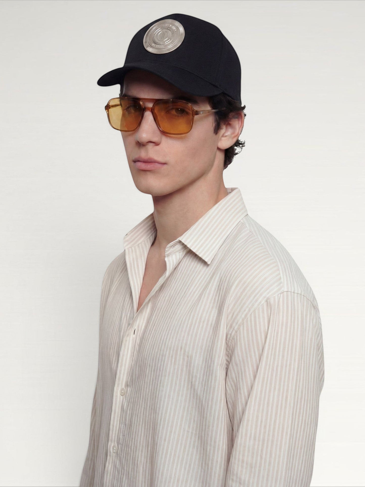 ILIMITO black cotton blend cap with silver medallion detail on the crown