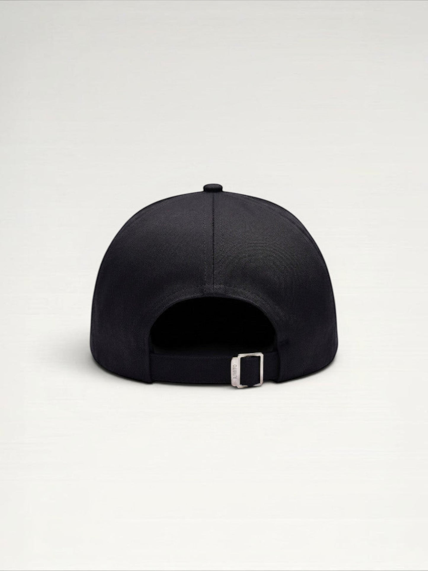 ILIMITO black cotton blend cap with curved brim, silver medallion detail on front, and silver medal accents on visor.