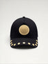 ILIMITO black cotton blend baseball cap with gold medallion emblem and gold medal accents on the visor.