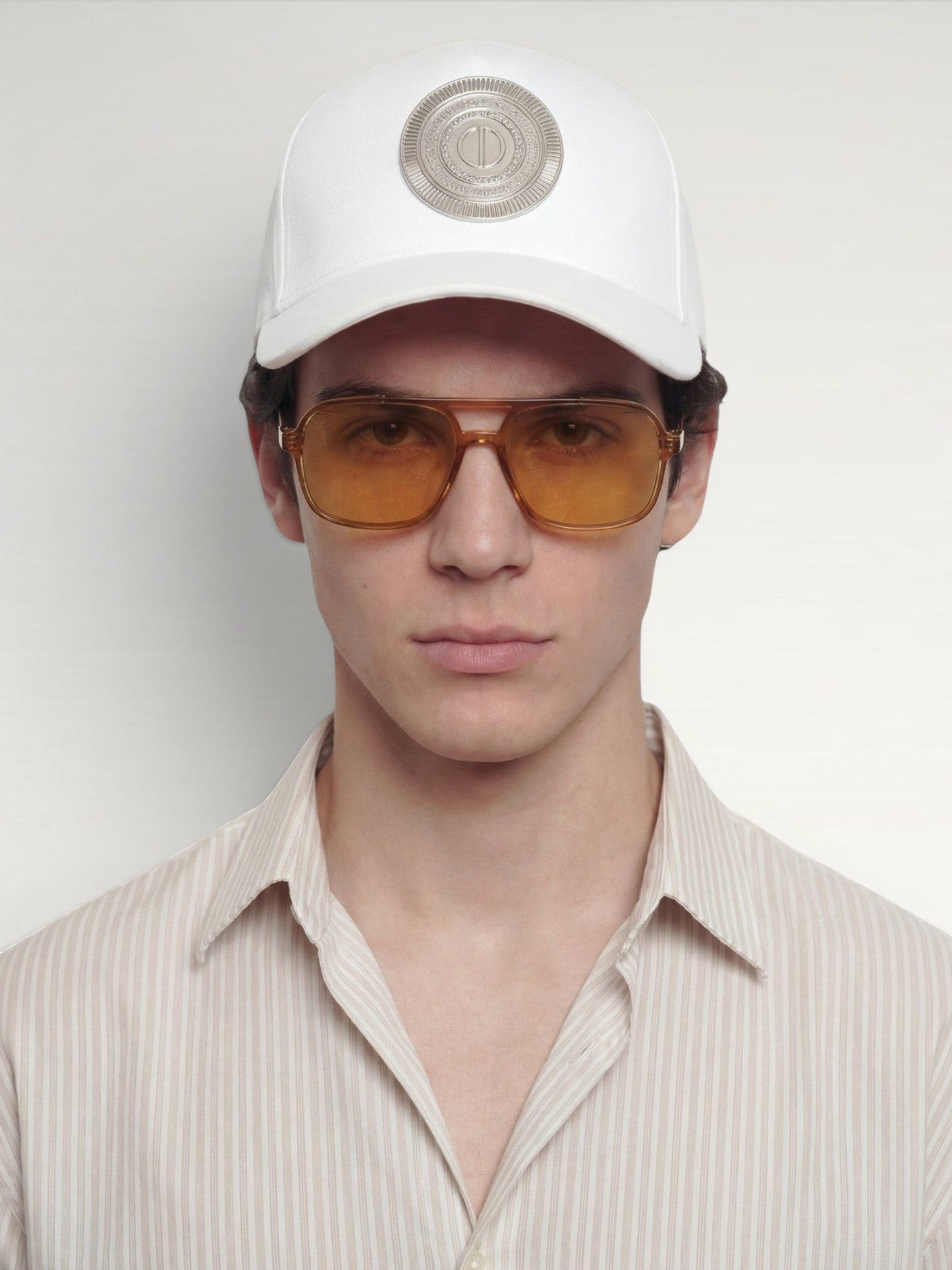 ILIMITO white cotton blend cap with curved brim and silver medallion detail on the front.